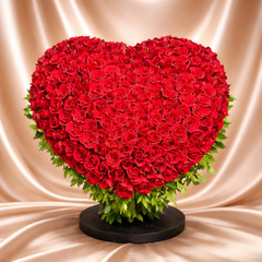 Heart-shaped arrangement of red roses 